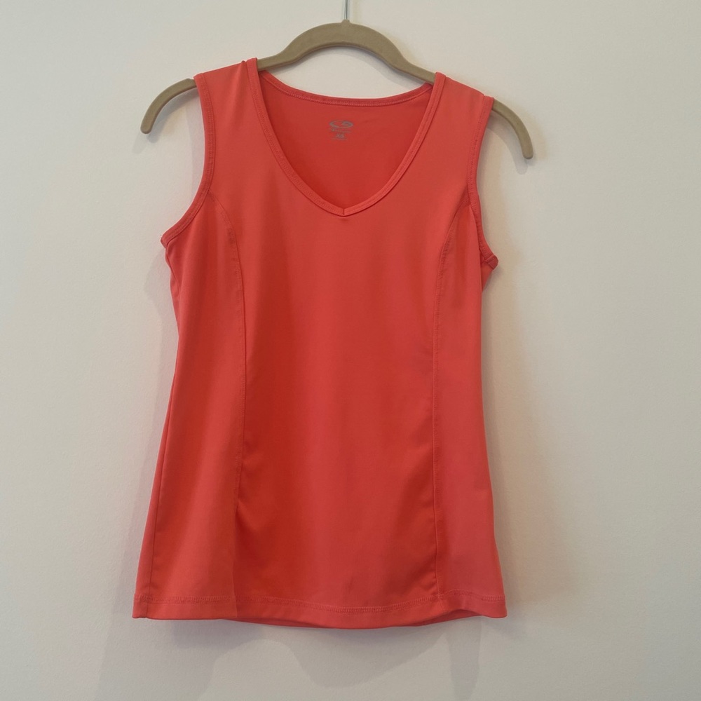 Bright orange athletic workout top